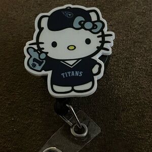 Hello Kitty Titans badge reel- Black and White
